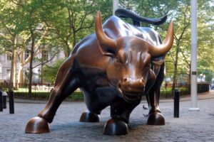 An image of the charging bull statue on Wall Street in New York City.