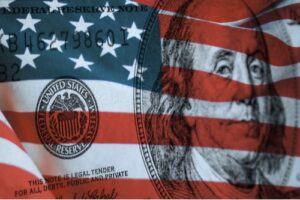 An image showing the Federal Reserve symbol and elements of the U.S. $100 bill superimposed on the American flag.