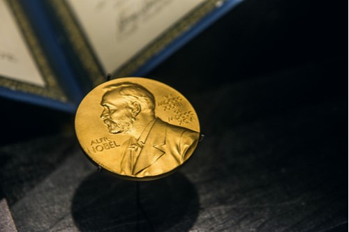 A photo showing a Nobel Prize medal on display.
