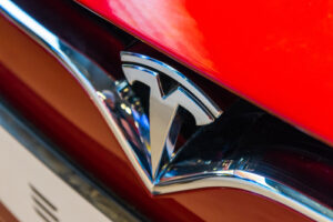 The Tesla logo symbolizes tech stocks’ reign over the market.