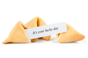 A fortune cookie contains the message “It’s your lucky day.”