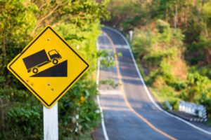 A traffic sign shows a steep incline ahead