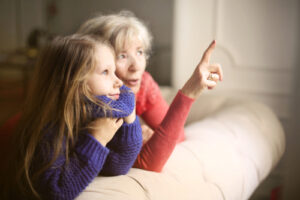 A grandmother spends time with her granddaughter