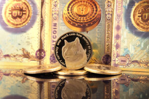 A physical representation of a gold Dogecoin in front of Bitcoin banknotes.