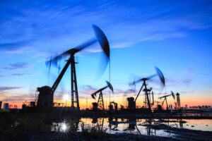 An oil field at sunset