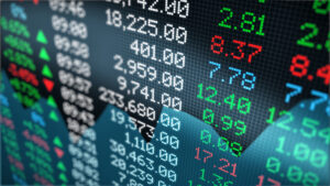 A photo of a close-up view of a stock market data board.