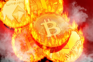 Cryptocurrency coins bursting into flames.