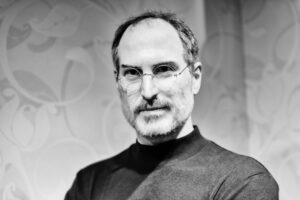 Wax sculpture of Steve Jobs in black and white at Beijing Madame Tussauds wax museum.