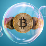 A group of gold Bitcoins inside of a bubble.