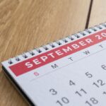 A close-up image of a calendar that’s turned to September 2023.