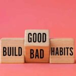 Wooden blocks that say, “good and bad habits.”